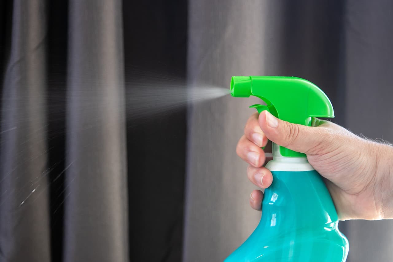 Professional cleaner vacuuming